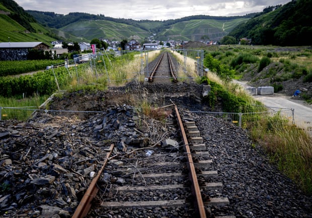 Debris from last year’s floods still lies on a destroyed railway line in the village of Dernau in the Ahr valley.