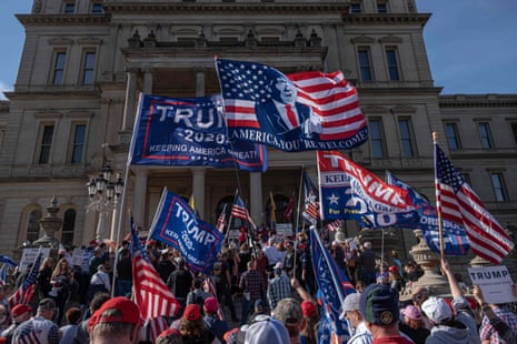 Donald Trump supporters rally at the state capitol in Lansing, Michigan, on Saturday.