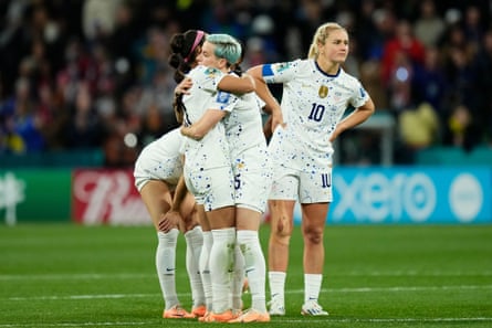 Sophia Smith, Megan Rapinoe and Lindsey Horan (left to right) console each other following their World Cup exit in 2023.