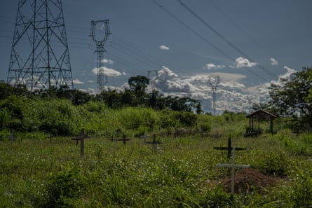 Power lines behind a cemetery.