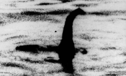 A photograph shows shadowy shape that some people say is the Loch Ness monster.