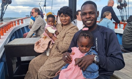 Faisal Abdullah, 31, pictured recently with his wife, Aisha Amin, 30, and their children Fatima, two and Baraa, five months.