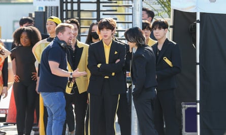 James Corden is seen with J-Hope, Jin, Jimin, V and Jungkook of the K-pop band BTS filming for the The Late Late Show With James Corden in 2021.