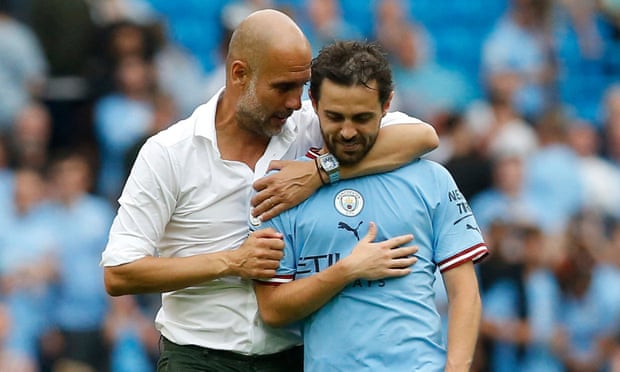 Pep Guardiola hugs Bernardo Silva after the player kicked off Manchester City’s revival in the second half.