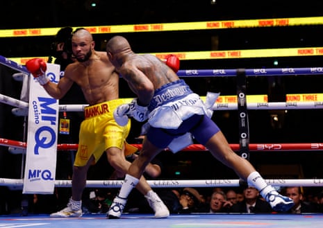 Conor Benn in action with Chris Eubank Jr during their middleweight fight.
