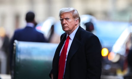 Trump photographed in the street in a suit and tie