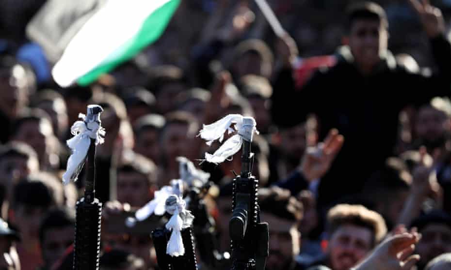 Mourners attend the funeral of Palestinian Fawaz Hamayel, in the West Bank village of Beita.