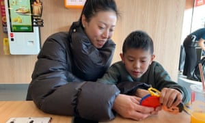 Xu Meiru with her son at McDonald’s