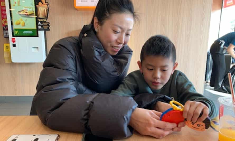 Xu Meiru with her son at McDonald's