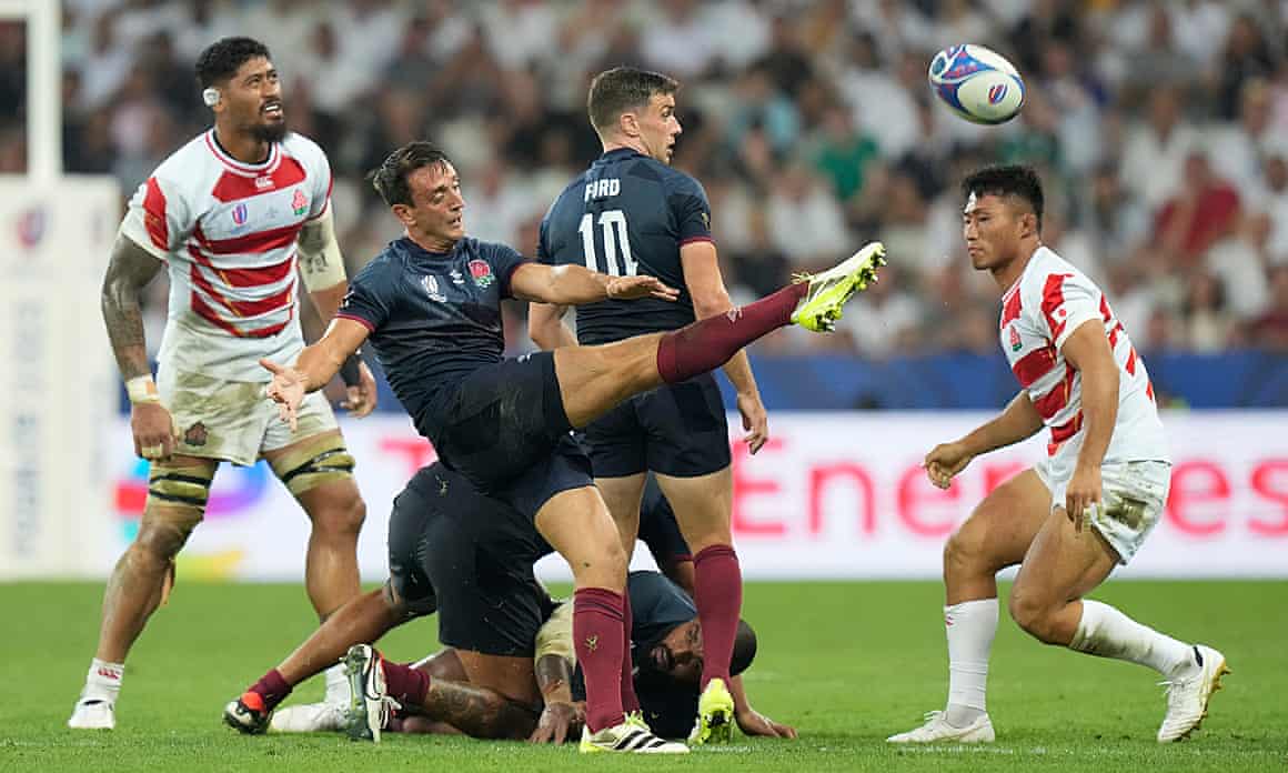 Alex Mitchell kicks during England’s victory over Japan.