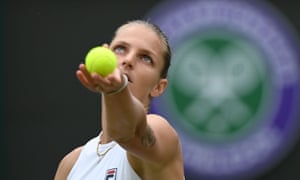 Czech Republic’s Karolina Pliskova serves against Switzerland’s Viktorija Golubic.