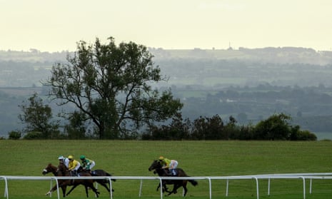 Runners race down the back straight during at Bath Racecourse on 10 October 2024
