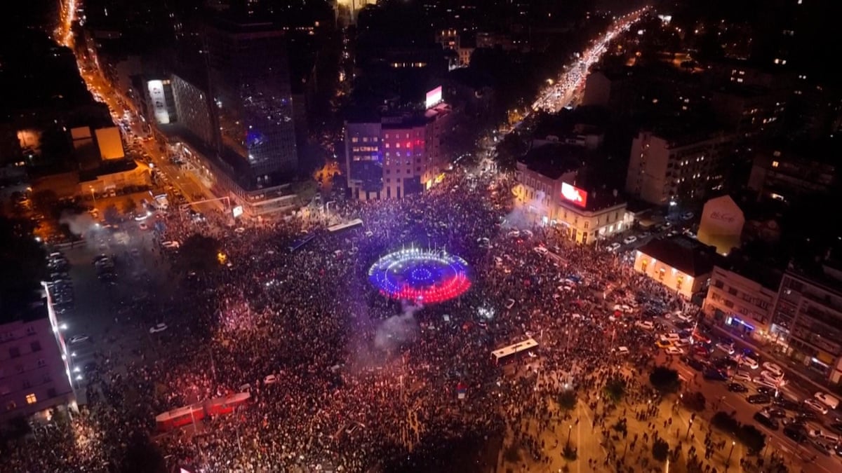 Drone footage shows crowds in Belgrade celebrating defeat of Aleksandar Vučić – video