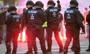 Riot police confront rightwing protesters in Chemnitz, eastern Germany, after the death of a 35-year-old German national