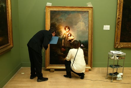 Incredible inheritance … staff inspect The Cottage Girl by Gainsborough.