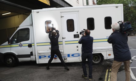 A van believed to be carrying Thomas Mair arrives under police escort at Westminster magistrates court.