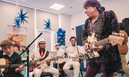 Stevie Van Zandt jamming with pupils.