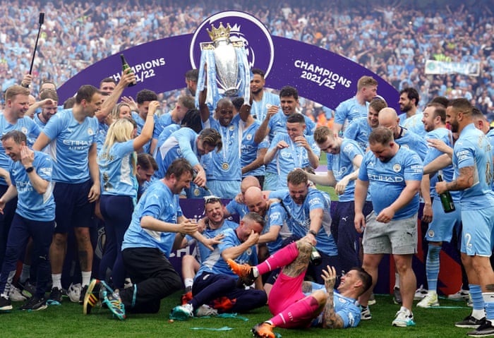 City’s players and staff celebrate.