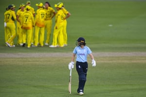 Amy Jones of England walks off the field after being dismissed by Tahlia McGrath of Australia for 16 runs.