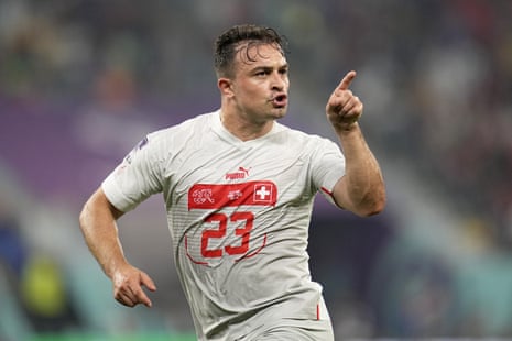 Xherdan Shaqiri lets the Serbia fans know what the score is