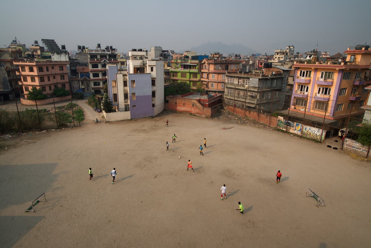 West African footballers practise at a ground in Naya Bazaar, in central Kathmandu