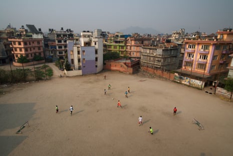 West African footballers practise at a ground in Naya Bazaar, in central Kathmandu