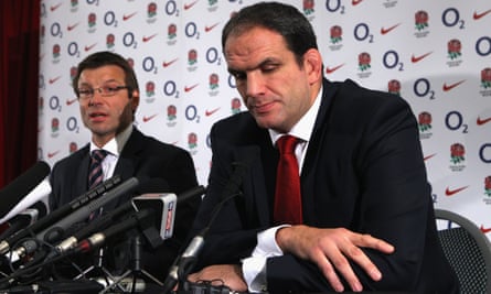 Andrew, left, sits alongside Martin Johnson as he announces his resignation as the England head coach in November 2011 at Twickenham.