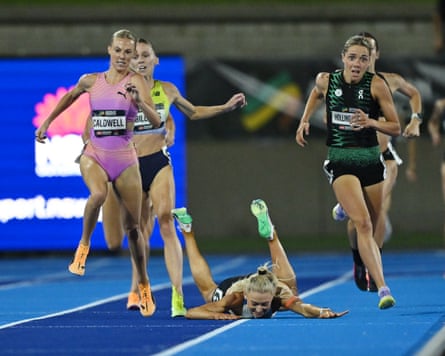 Jessica Hull falls on the final straight as Abbey Caldwell and Claudia Hollingsworth race to the finish in the women’s 1500m final