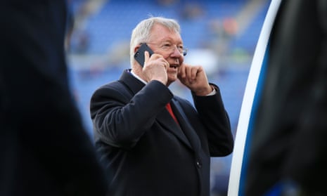 Sir Alex Ferguson on the phone