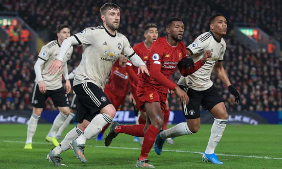 Liverpool in action against Manchester United in January. The Premier League hopes to complete the season.