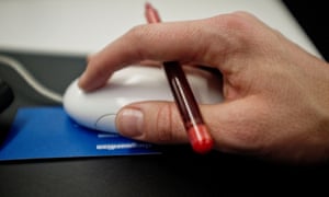 Hand on computer mouse