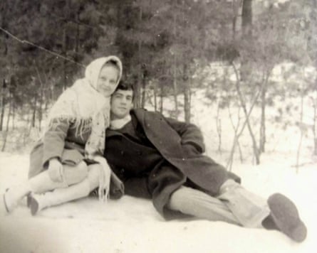 A black and white photo of Natalia Khodymchuk and her husband, Valerii, in the snow