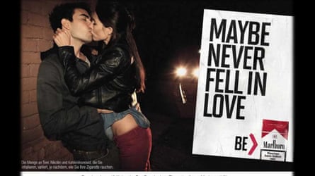 A picture of a couple kissing and a poster that reads ‘Maybe never fall in love, Be Marlboro’