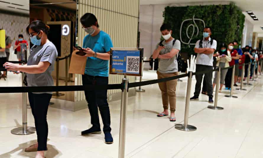 People queue for vaccine