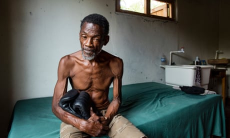 Vernon Vanriel in the roadside shack where he lives without electricity or a bathroom.