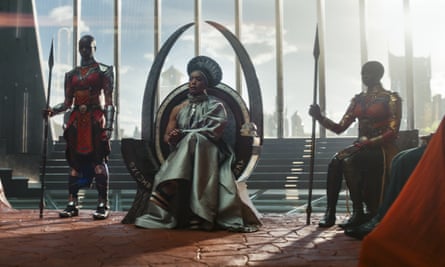 Dorothy Steel as Merchant Tribe Elder, Florence Kasumba as Ayo, Angela Bassett as Ramonda and Danai Gurira as Okoye in Black Panther: Wakanda Forever.