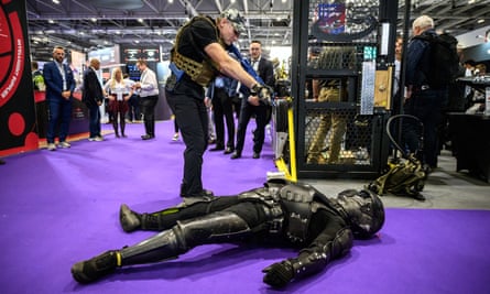 A man wearing a Chiron-X1 High-Impact Close Quarter Fighting Training Suit is attacked by a member of the sales team.
