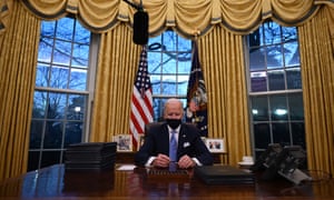 Joe Biden in the newly decorated Oval Office.