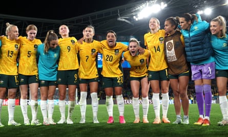 Australia huddle after their 2-0 victory over Denmark.