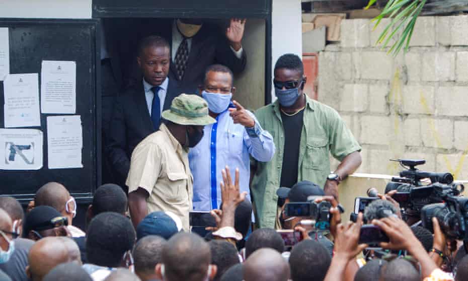 Yves Jean Bart leaves the prosecutor’s office in Port-au-Prince, Haiti, during an investigation into the sexual abuse allegations made against him.