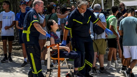 Wildfires, red alerts and attractions closed as heatwave sweeps southern Europe – video