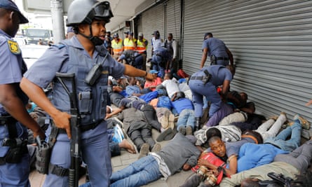 South African police use force to disperse anti-immigration protesters | South Africa | The Guardian