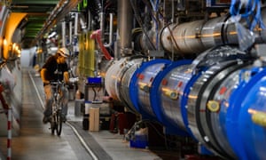A worker rides on his bicycle in Cern’s Large Hadron Collider (LHC) tunnel.