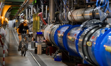 A worker rides on his bicycle in Cern’s Large Hadron Collider (LHC) tunnel. 
