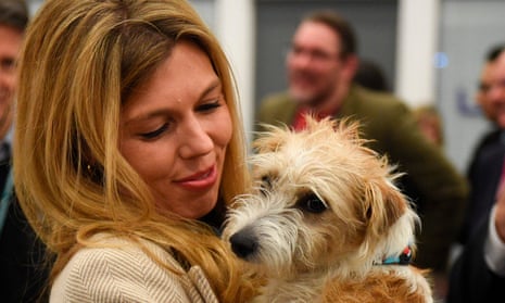 Carrie Symonds with Dilyn, the dog she shares with Boris Johnson, in December.