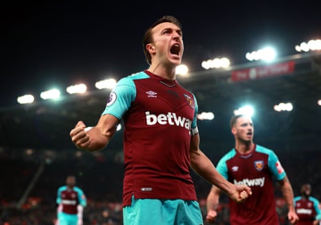West Ham United’s Mark Noble celebrates after giving the Hammers the lead from the penalty spot.