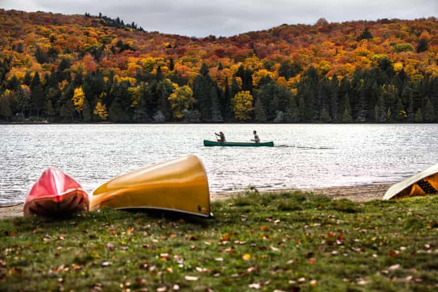 Canoeists on a lake in Algonquin park.