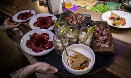 Food is ready to be served from the kitchen of Klopotenko's restaurant