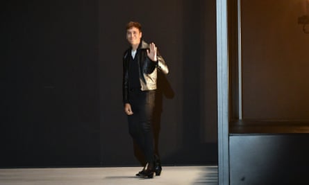 Hedi Slimane waving to the audience after the show.