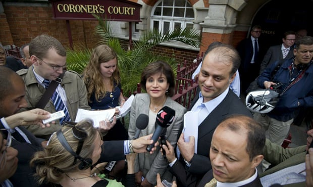 Mona Marwan (centre) and Ahmed Marwan (centre right), widow and son of Ashraf Marwan, leaving court in London after the 2010 inquest into his death returned no verdict.